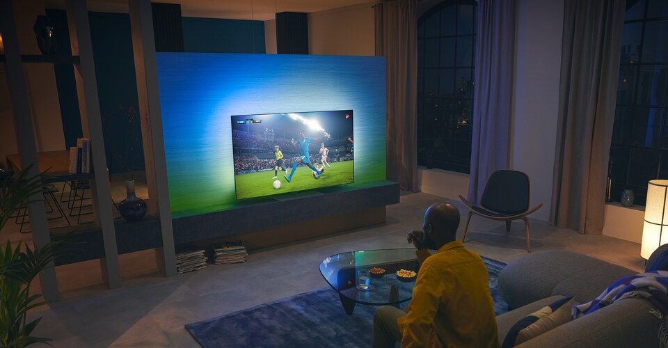 Sporta mačs ar OLED TV
