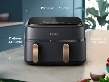 Uz letes novietota Philips ierīce ar diviem groziem, un ir aprakstīti tās izmēri: platums – 38,25 cm, dziļums – 31,42 cm un augstums – 44,39 cm